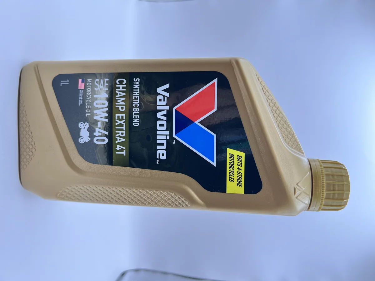 (f)น้ำมันเครื่อง Valvoline synthetic blend champ extra 4T 10W-40 1 ลิตร